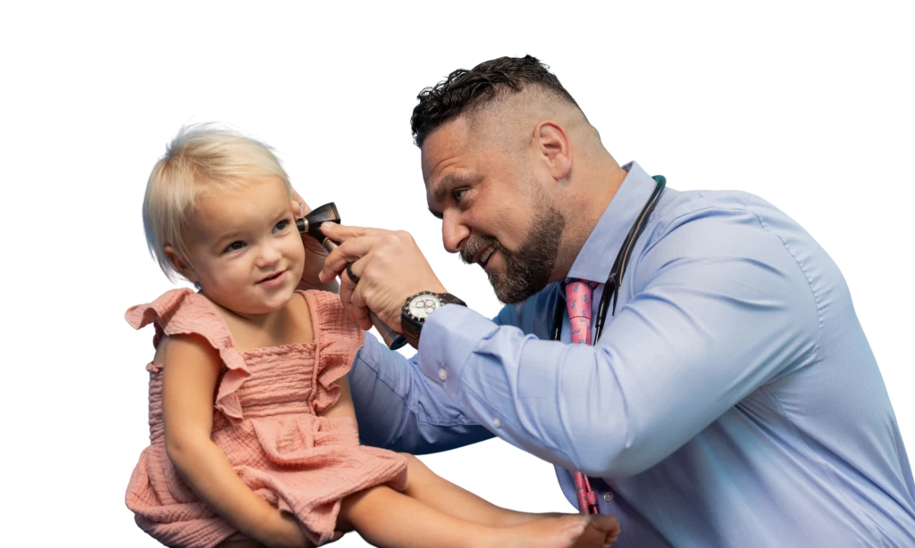 male provider examining patient ear
